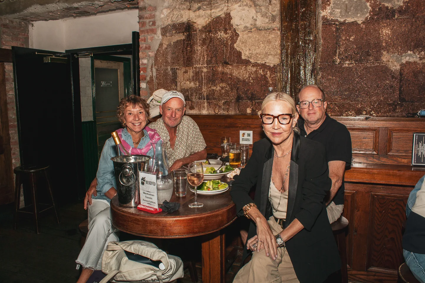 Guests dining together at Brass Monkey