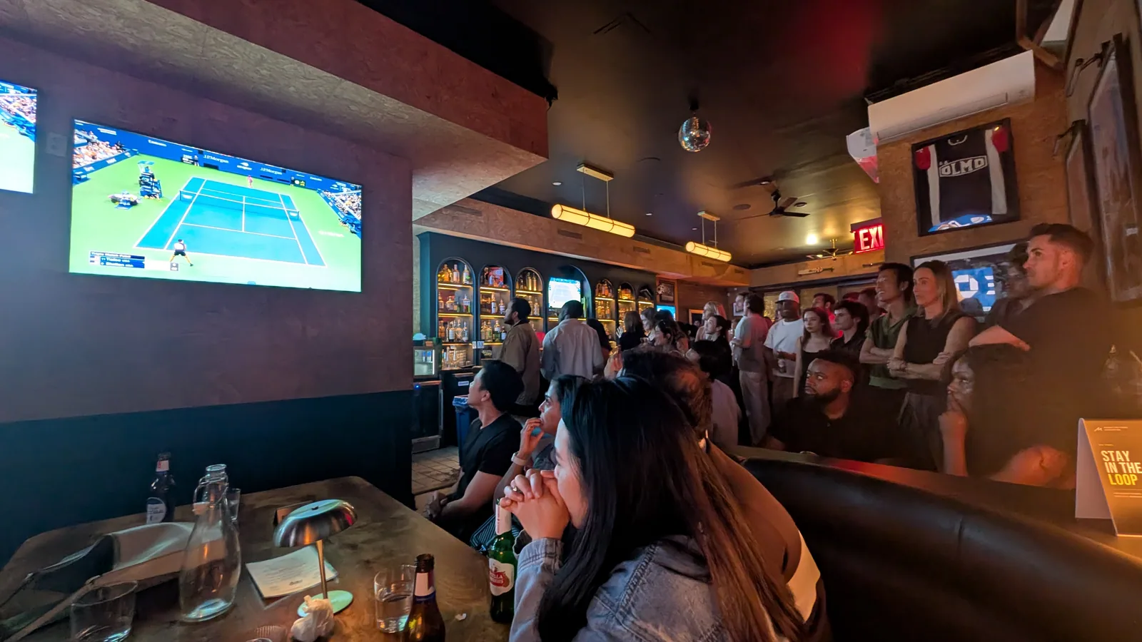 Guests watching the US Open men’s semifinals together at Brass Monkey